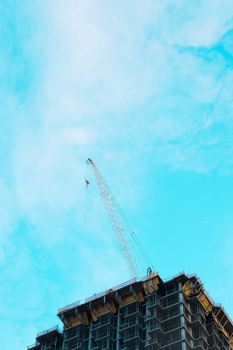construction crane gray metal crane under cloudy sky toronto